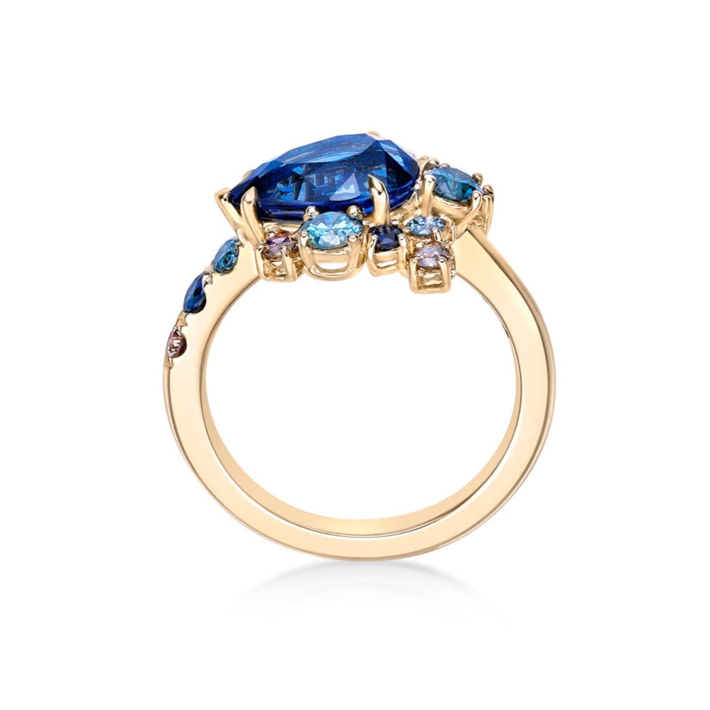 Contemporary Blue Sapphire and Champagne diamond Cluster Engagement Ring
