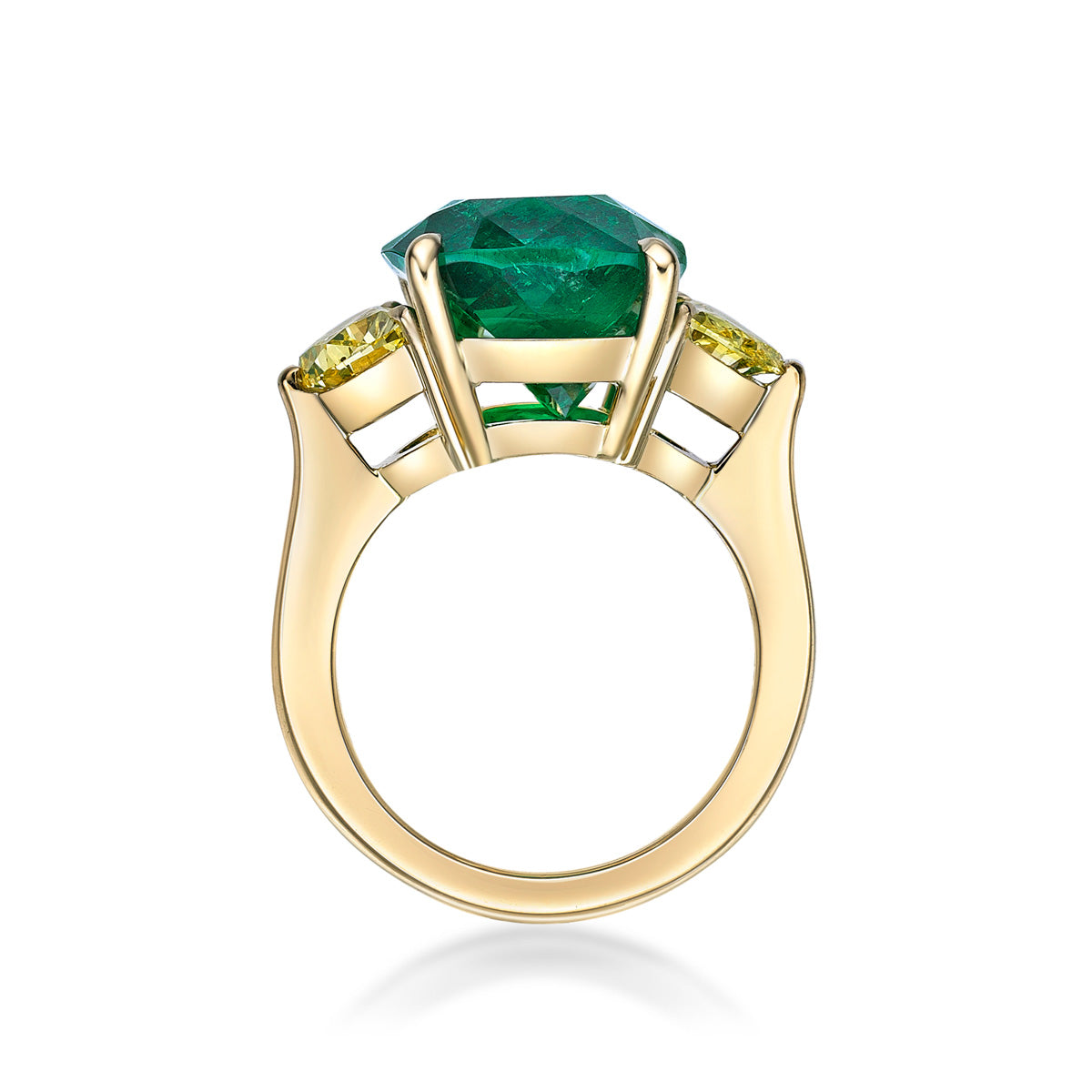 6.48ct Cushion Cut Colombian Green Emerald in a handmade 18K Yellow Gold 3-stone setting with 75pt half-moon Yellow diamond sidestones