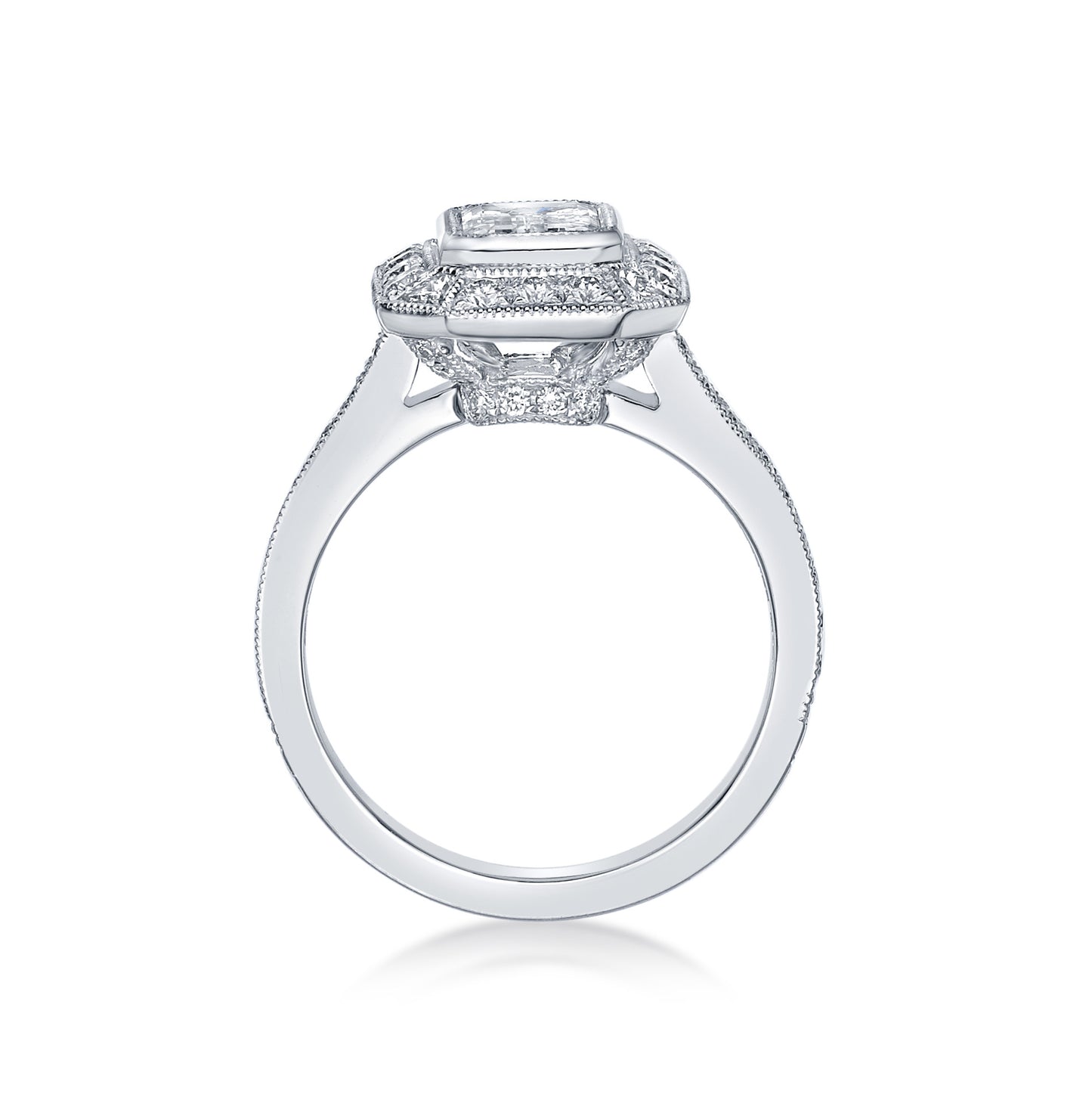1.01ct Emerald Cut Diamond bezel set in an 18K White Gold Vintage-style handmade setting