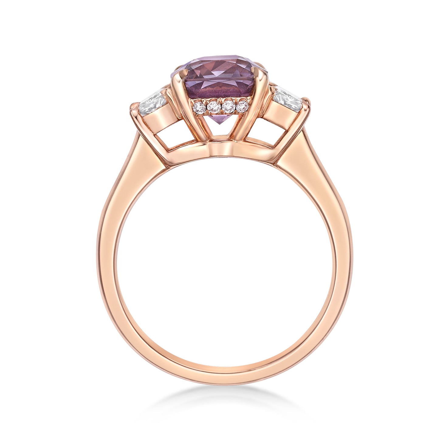 2.63ct Cushion-cut Purple Spinel in a handmade 18K Rose Gold 3-stone basket setting, matching 22pt Trapeze diamond sidestones, and bezel set round brilliant diamond under bridge of the ring