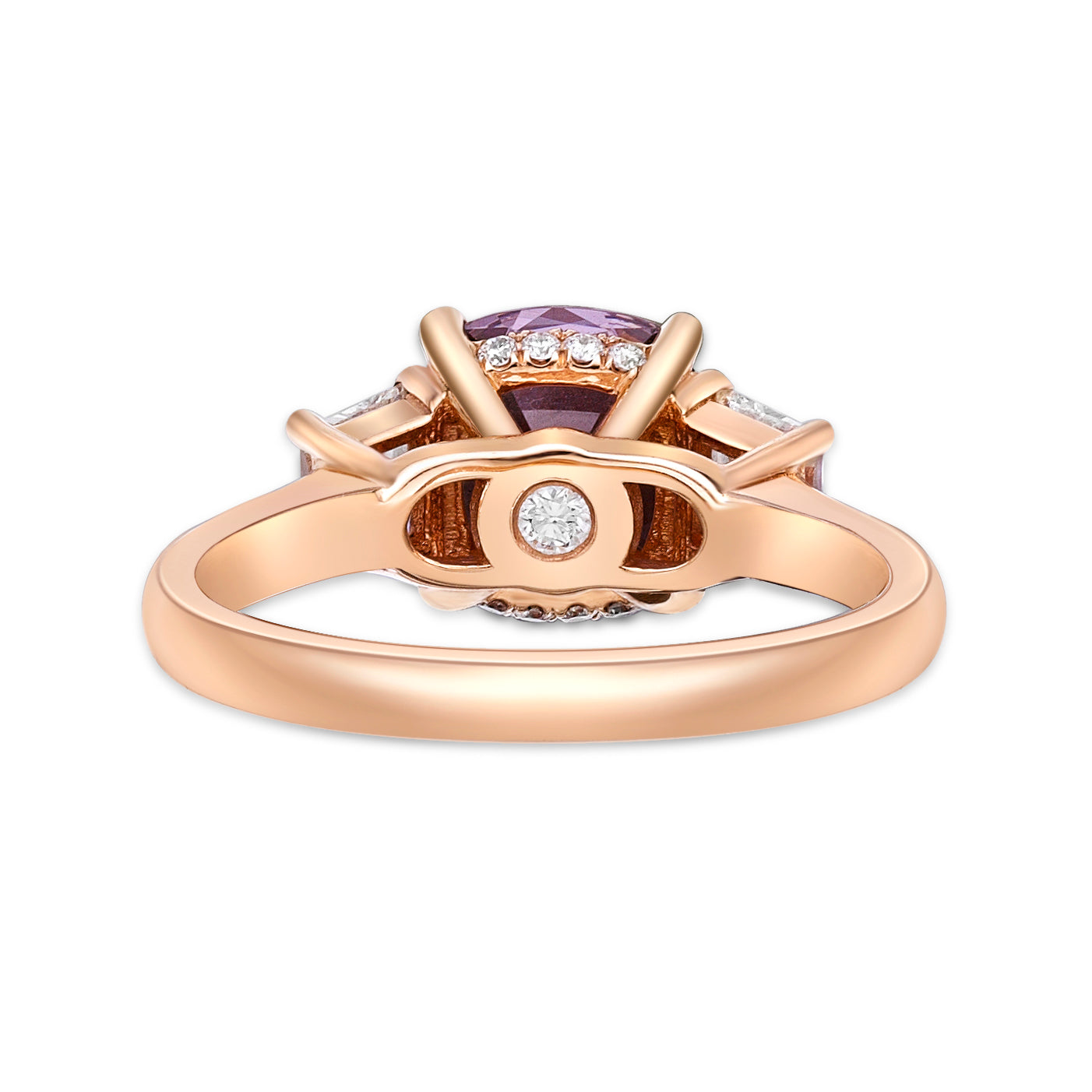 2.63ct Cushion-cut Purple Spinel in a handmade 18K Rose Gold 3-stone basket setting, matching 22pt Trapeze diamond sidestones, and bezel set round brilliant diamond under bridge of the ring