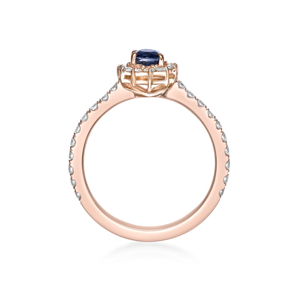 2ct Oval Blue Sapphire in a handmade 18K Rose Gold setting with Floral Diamond Halo