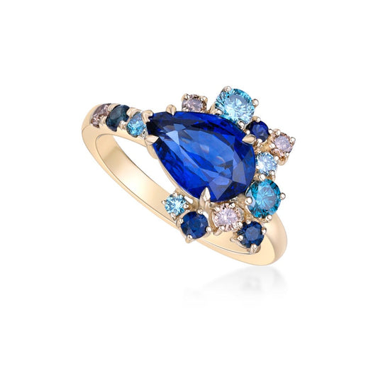 Contemporary Blue Sapphire and Champagne diamond Cluster Engagement Ring