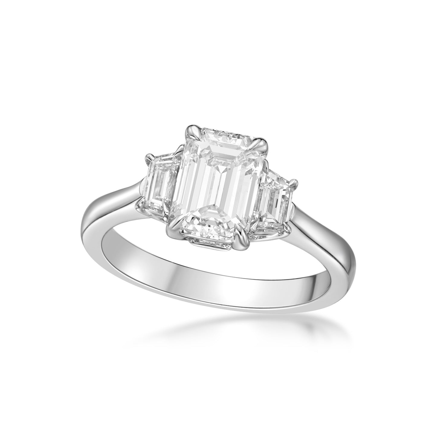 1.54ct Emerald cut diamond in an 18K White Gold engagement ring setting with Trapeze Diamond Sidestones