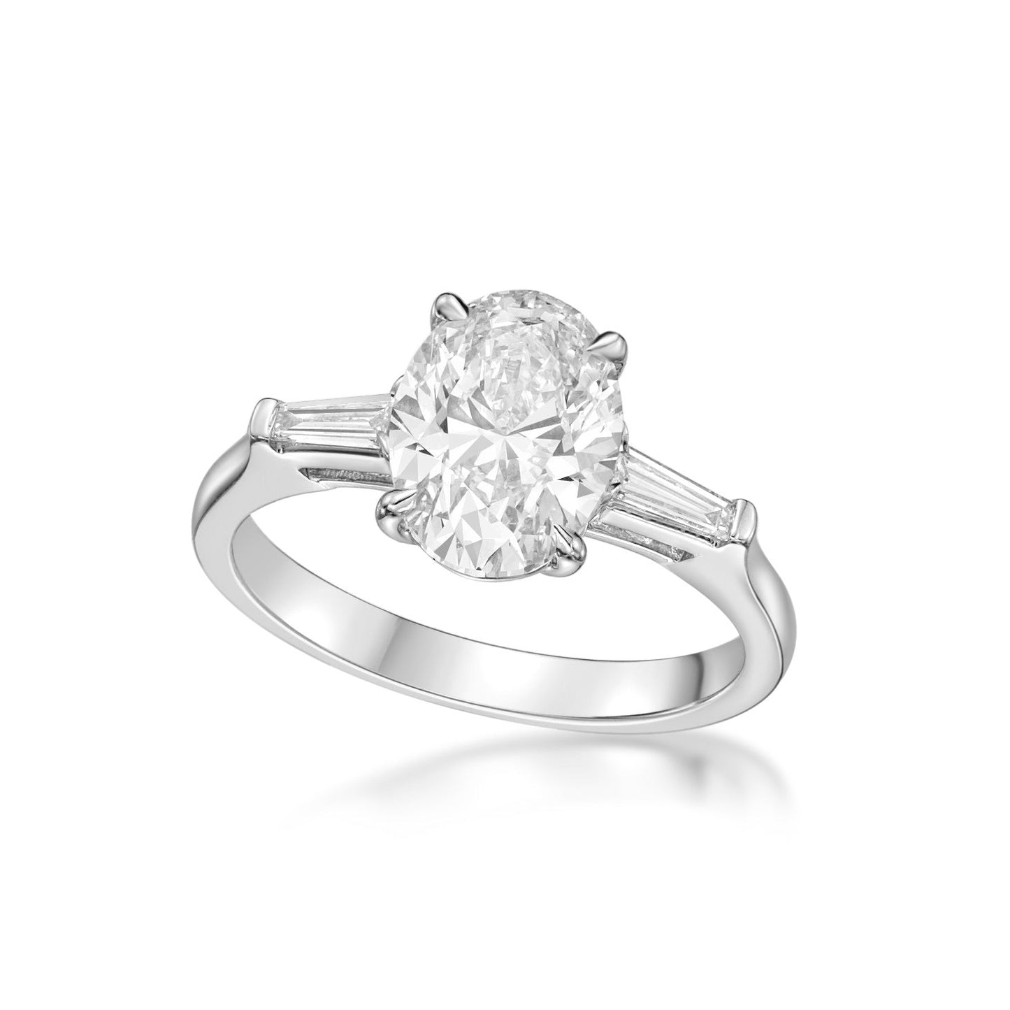 2.01ct Oval Brilliant diamond in a handmade 18K White Gold basket setting with 15pt Tapered baguette diamond sidestones