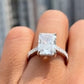 4.01ct Radiant Cut Diamond in a handmade 18K White Gold engagement ring setting with hidden halo of round brilliant diamonds