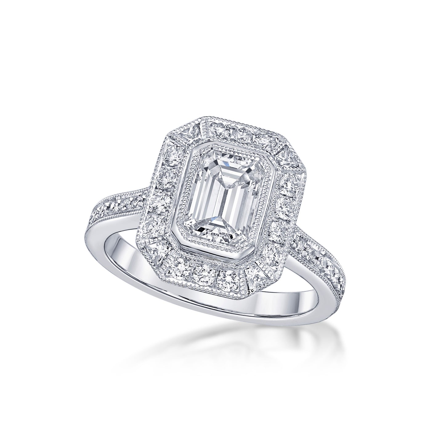 1.01ct Emerald Cut Diamond bezel set in an 18K White Gold Vintage-style handmade setting