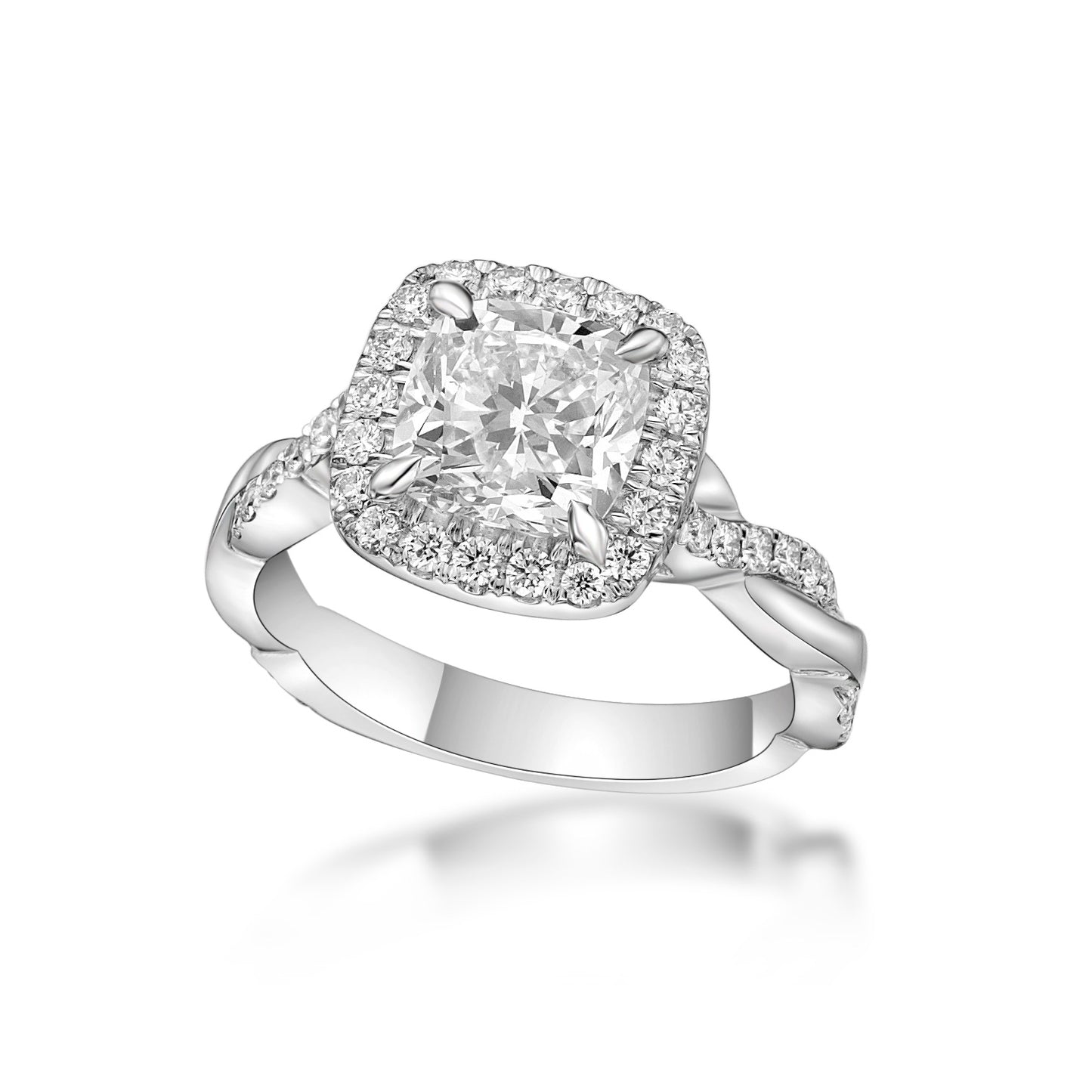 1.50ct Cushion Modified brilliant diamond in an 18K White Gold Diamond Halo engagement ring setting with a twisted diamond eternity band