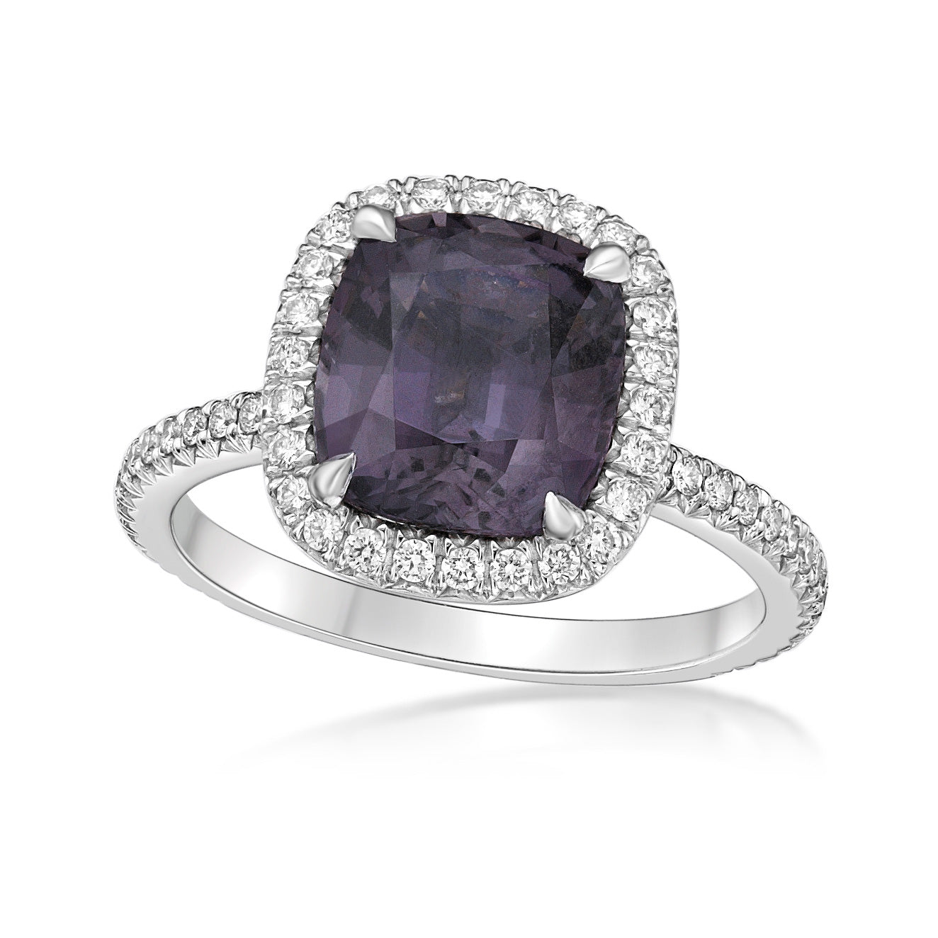 3.75ct Cushion-cut Purplish Grey Spinel set with four nail claws in a handmade 18K White Gold wall-set diamond halo setting