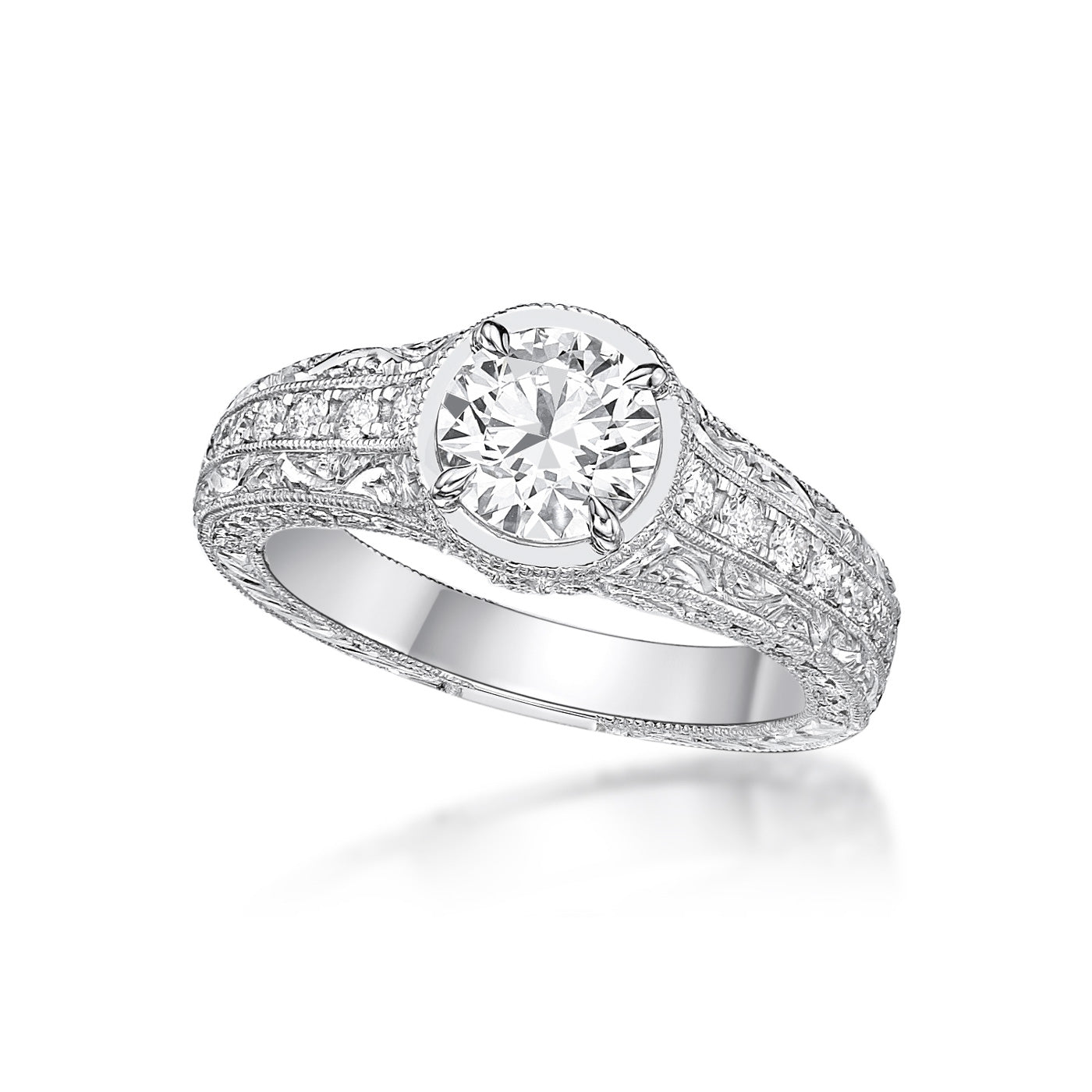 1.20ct Round Brilliant diamond set with four claws in a handmade 18K White Gold Vintage-style setting, custom milgrain band with micropave set diamonds and filigree detailing on side profile