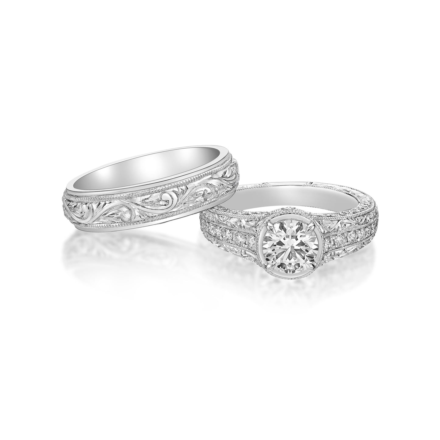 1.20ct Round Brilliant diamond set with four claws in a handmade 18K White Gold Vintage-style setting, custom milgrain band with micropave set diamonds and filigree detailing on side profile